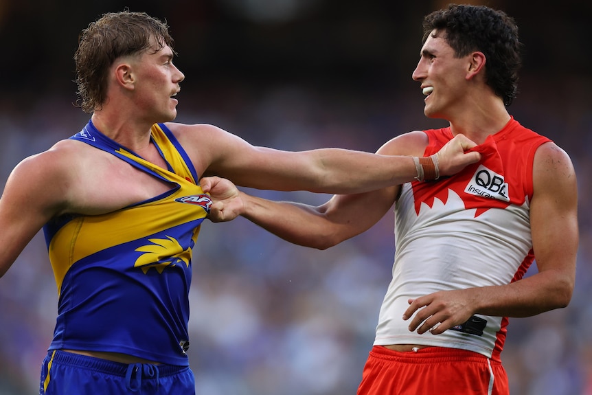 Harley Reid is involved in an altercation with Justin McInerney during the Eagles vs Swans AFL match in Perth.