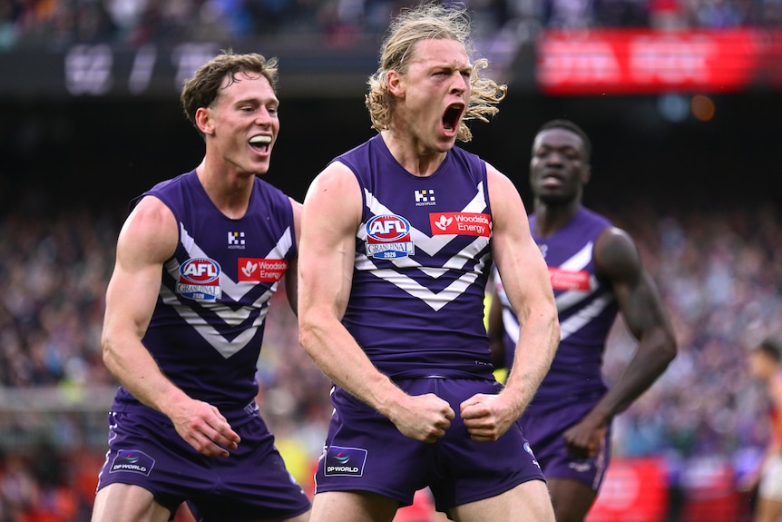 Hayden Young celebrates a goal for Dockers in AFL grand final.