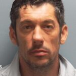 Man jailed for throwing bottle at migrant protest
