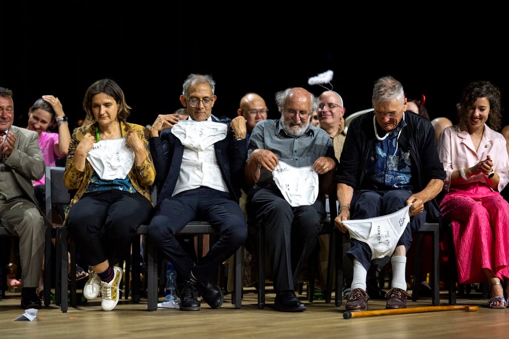 (From left) Nobel Prize winners Esther Duflo, Abhijit Banerjee, Michel Mayor and Tim Hunt look at the underpants handed over by the Soil Science Award Winners during the Ig Nobel Prize ceremony in Zurich on Thursday. Photo: EPA