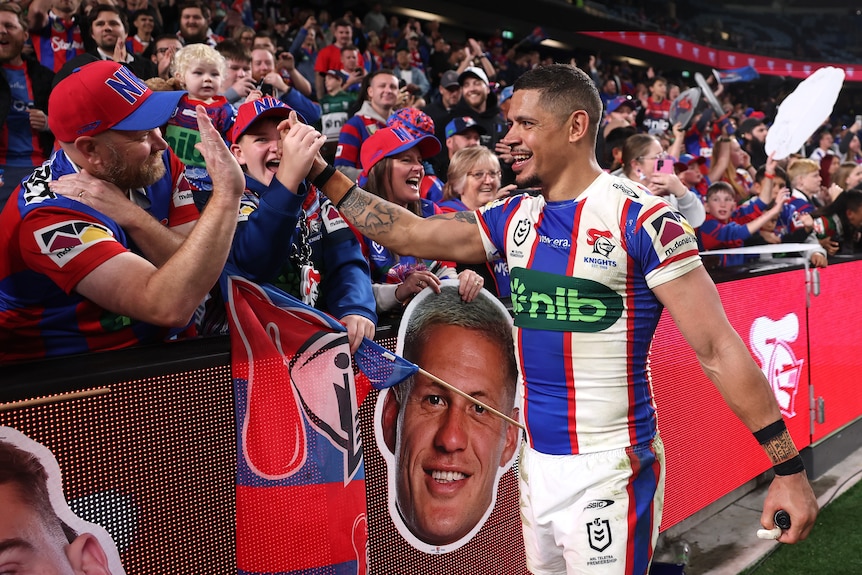 Dane Gagai celebrates winning a rugby league finals match 