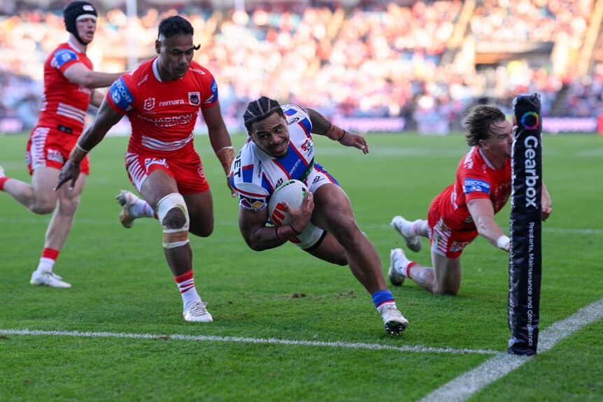 NRL play scores as defenders fall over