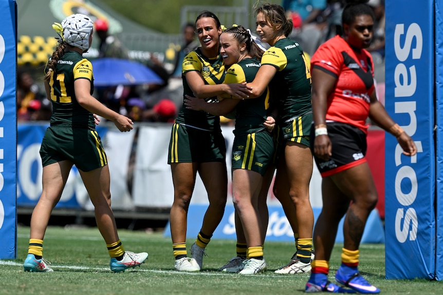 Australia's women's team celebrate.