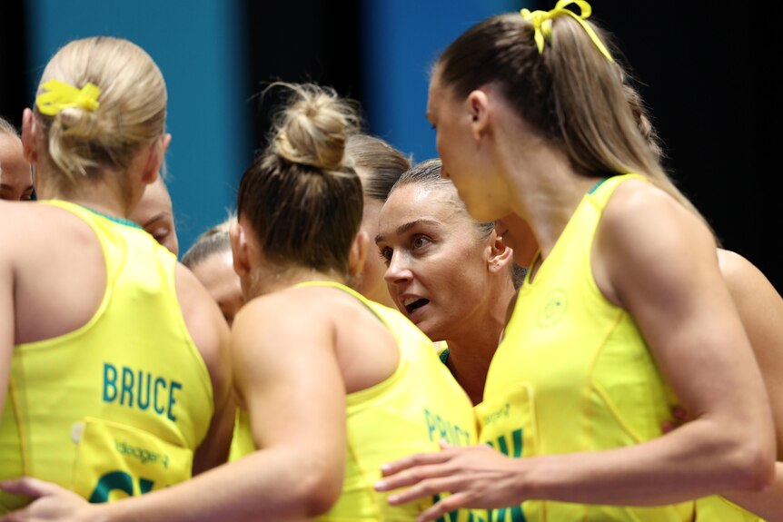 Diamonds captain Liz Watson speaks to her Australian team at the Commonwealth Games bronze medal netball match against England.