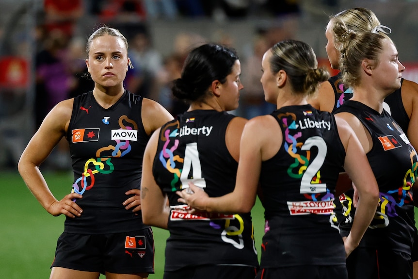 Mia Busch of the Bombers looks dejected after a loss.