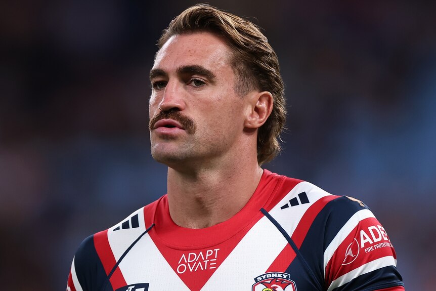 Connor Watson warms up ahead of a Sydney Roosters' NRL match in 2026.