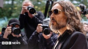 Russell Brand was a ‘sexual predator’, prosecution alleges as rape trial begins