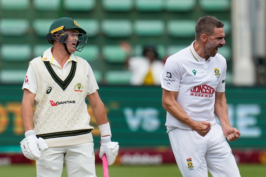 Anrich Nortje celebrates next to Marnus Labuschagne