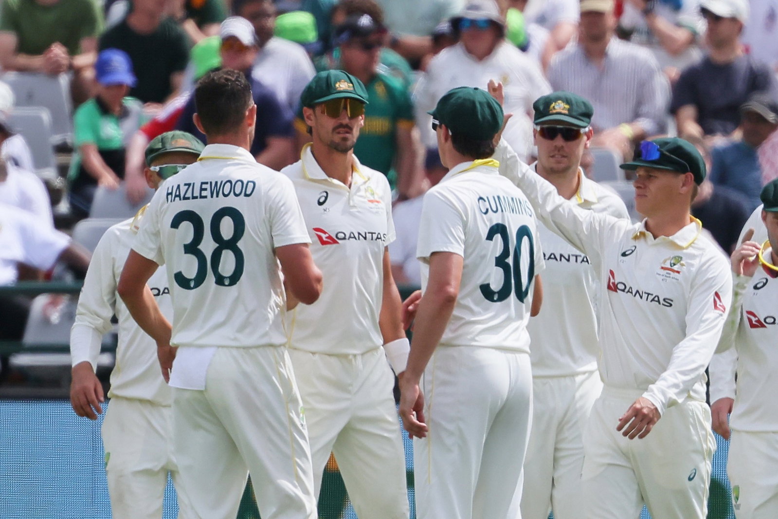 Mitchell Starc (centre) took an excellent catch in the deep to remove Aiden Markram for 78.