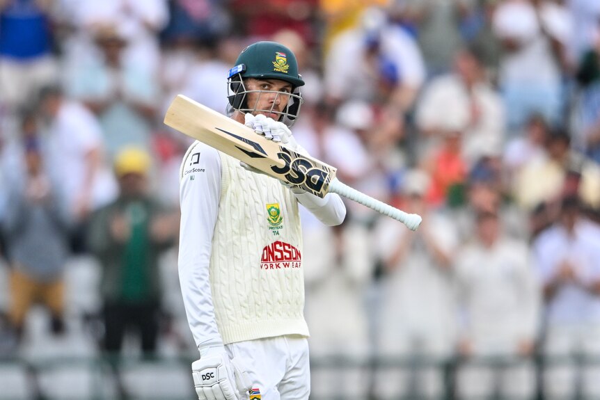Marco Jansen celebrates half-century by raising bat
