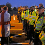 Twelve arrests after protest over migrant boat arrival
