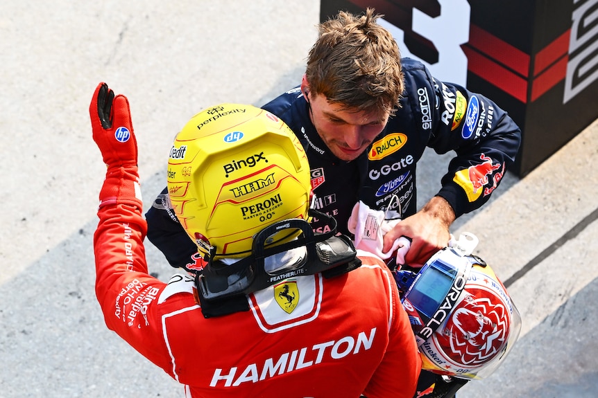 Lewis Hamilton and Max Verstappen hug