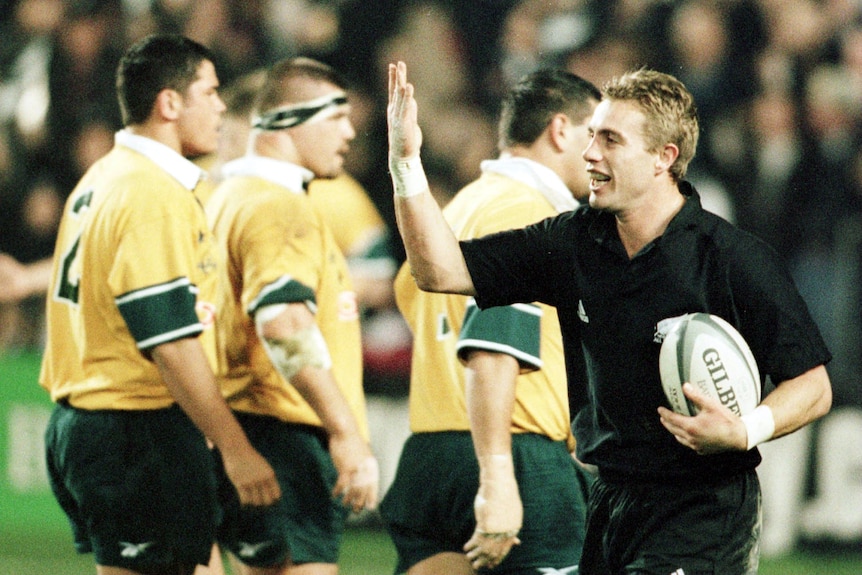 Justin Marshall celebrates a try for the All blacks against the Wallabies in 1999 Bledisloe Cup.